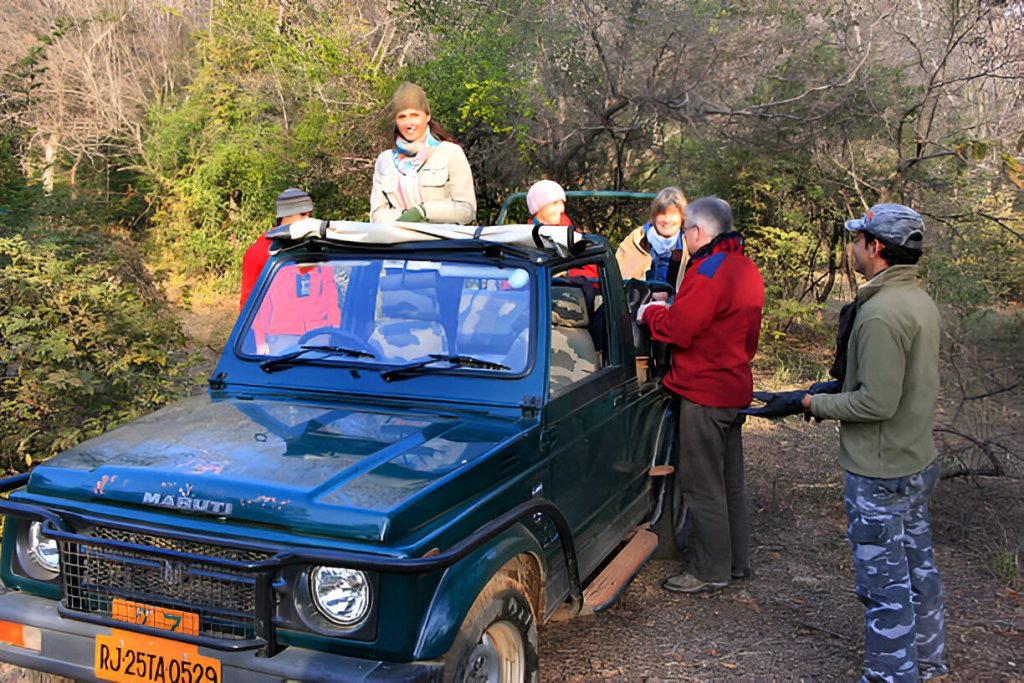 What’s the wildlife photography scene like in Ranthambore? 1 Tourists going on a tiger safari, Ranthambore National Park, Ind stock photo